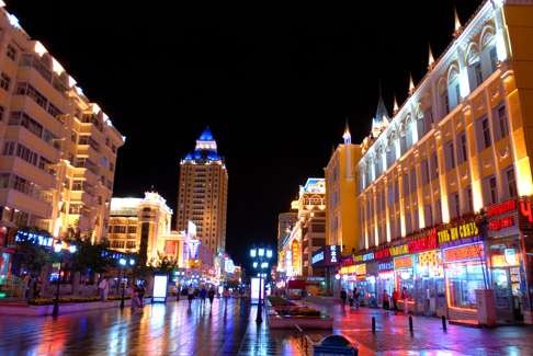 A night view of the shopping street in Manzhouli city, popular with Russian shoppers. Photo: Imaginechina
