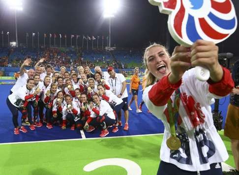 GB players celebrate winning the gold medal by taking a selfie. Photo: Reuters