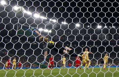 Dzsenifer Marozsan of Germany scores the first goal past Sweden goalkeeper Hedvig Lindahl. Photo: Reuters