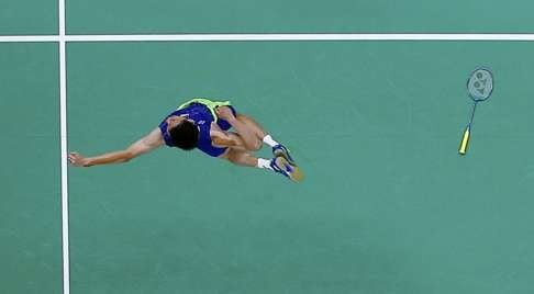 Lee Chong Wei jumps for joy after winning his epic semi-final against Lin Dan. Photo: Reuters