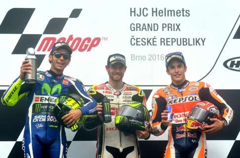 Valentino Rossi (left) Cal Crutchlow and Marc Marquez. Photo: AFP