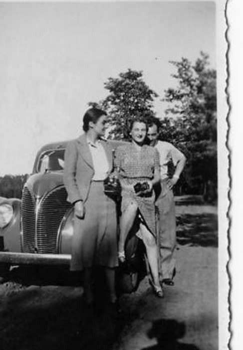 Hollingworth (left) with the consul general’s car she borrowed to cross the Germany-Poland border in 1939.
