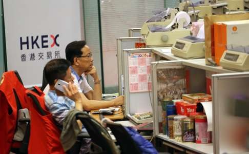 By allowing dual shares, Singapore has put more pressure on the Hong Kong bourse. Photo: Felix Wong
