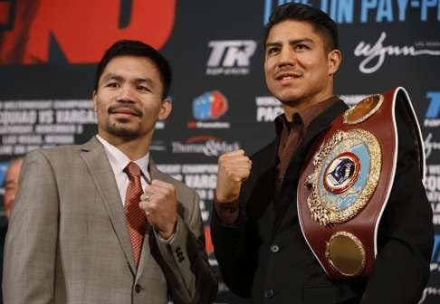 Pacquiao posed with Jessie Vargas to promote their November bout. Photo: AP