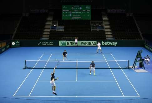 Britain’s Andy Murray and Jamie Murray during practice. Photo: Reuters