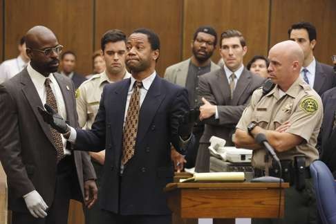 Sterling K. Brown (left) as Christopher Darden and Cuba Gooding, Jr. as O.J. Simpson in The People v. O.J. Simpson: American Crime Story.