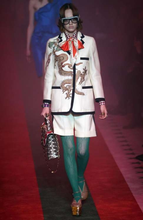 Dragons and other mythical creatures adorned Gucci creations. Photo: EPA