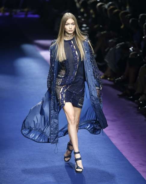 Gigi Hadid in Versace’s moody blues. Photo: AP