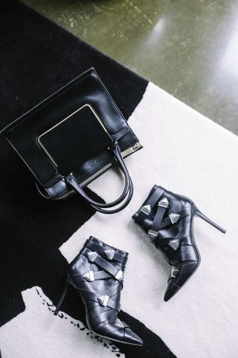 Roger Vivier black leather bag and silver buckle heels by Stella Luna. Photo: Bryant Lee