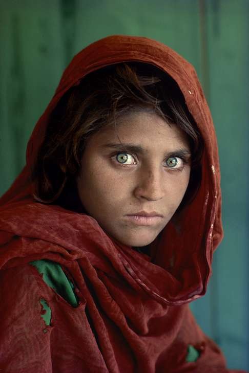 McCurry’s famous shot of Sharbat Gula at Nasir Bagh refugee camp near Peshawar, Pakistan, 1984. Photo: Steve McCurry