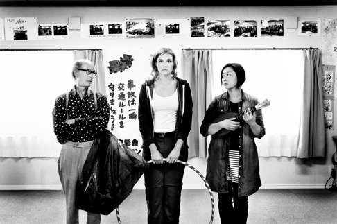 Rosalie Thomass (centre) plays a German woman who joins a circus troupe, led by Moshe Cohen (left), in Fukushima, Mon Amour.
