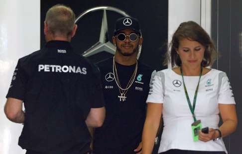 Lewis Hamilton leaves his garage. Photo: Reuters