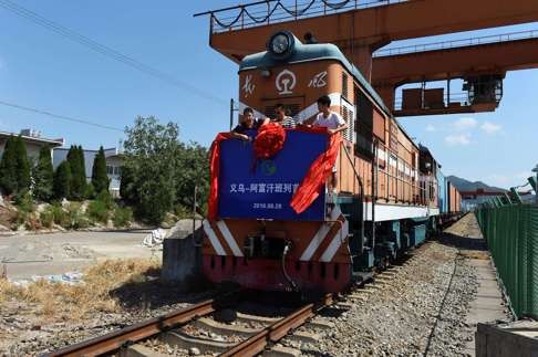 The inaugural freight train on a line from China to Afghanistan leaves its depot in August. Photo: Reuters