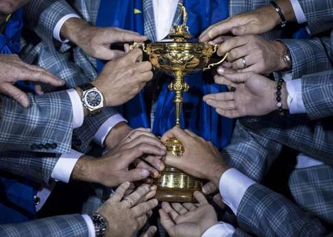 Members of Team Europe hold the Ryder Cup after the final day of the 39th Ryder Cup at the Medinah Country Club in 2012. Photo: AFP