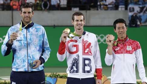 Andy Murray (centre) at the Olympic Games. Photo: AP
