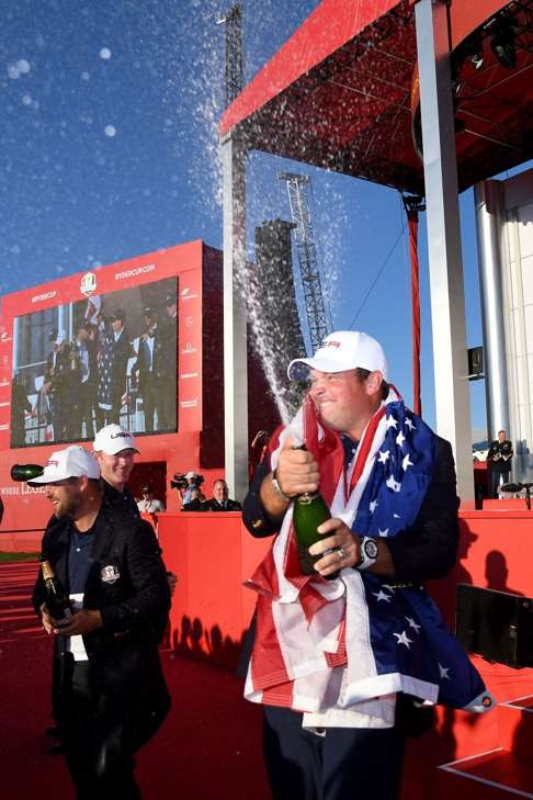 Patrick Reed of the United States celebrates during the closing ceremony of the 2016 Ryder Cup at Hazeltine. Photo: AFP
