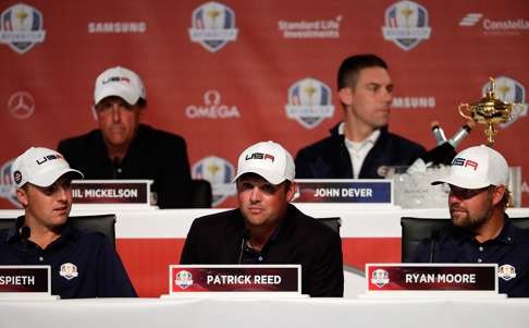 United States players speak during a press conference after defeating Europe to win the 2016 Ryder Cup with the champagne on ice. Photo: AFP