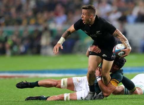 South Africa's Warren Whiteley tackles TJ Perenara. Photo: AFP