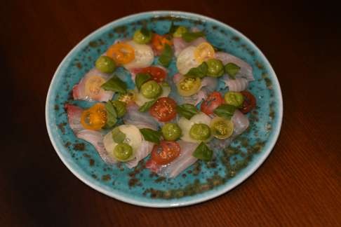 Shimaaji with pickled heritage tomatoes and avocado.