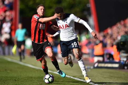 Bournemouth midfielder Dan Gosling (left) vies with Tottenham Hotspur’s Dele Alli. Photo: AFP