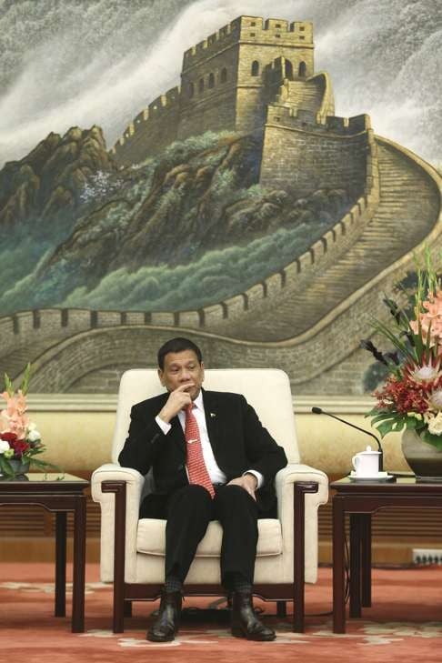 Philippine President Rodrigo Duterte attends a meeting with Zhang Dejiang, chairman of the Standing Committee of the National People's Congress of China, at the Great Hall of the People in Beijing last Thursday. Photo: AP