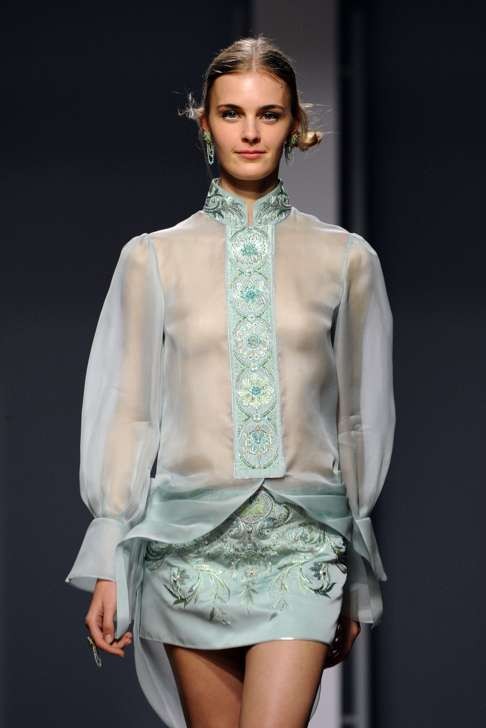 Brocade and embroidery were features of the Guo Pei collection presented in Singapore. Photo: Xinhua