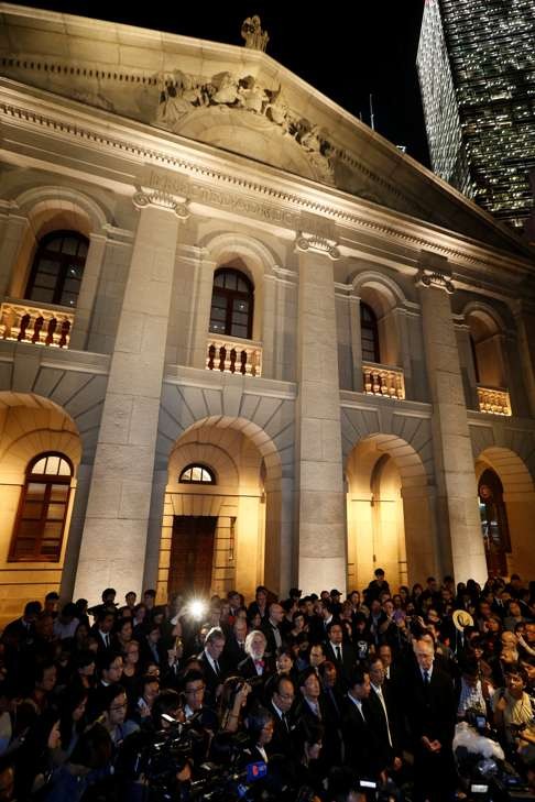 Members of Hong Kong’s legal fraternity stage a silent protest outside the Court of Final Appeal on Tuesday night, in protest against Beijing's fifth interpretation of the Basic Law. Photo: Reuters