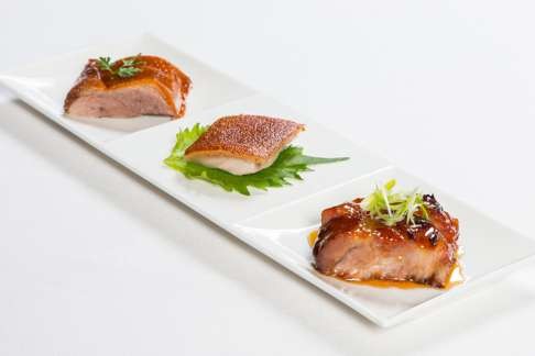 A trio of pork appetiser from Lung King Heen.