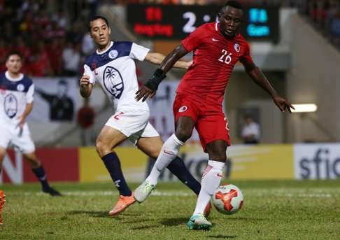 Hong Kong’s Alex Akande attacks against Guam. Photo: Jonathan Wong