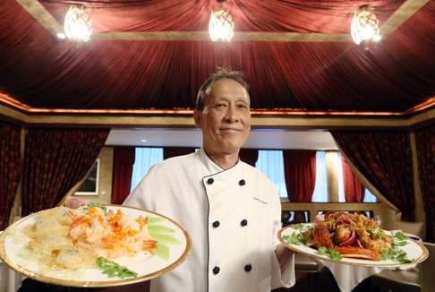 T'ang Court executive chef Kwong Wai-keung with sautéed prawns and crab roe and stir-fried fresh lobster.