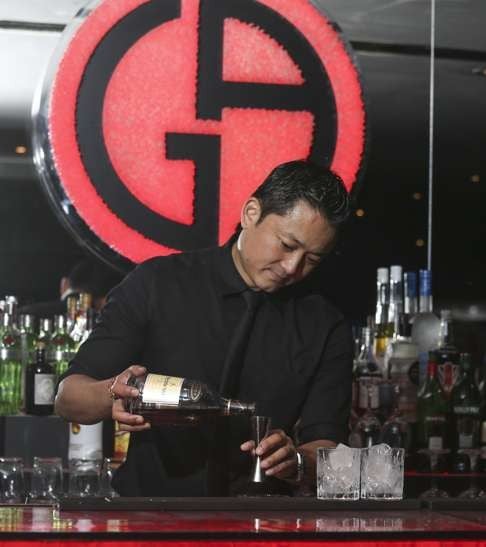 Lalit Limbu at work on a Sazerac at Armani/Privé in Chater House, Central. Photo: K.Y. Cheng