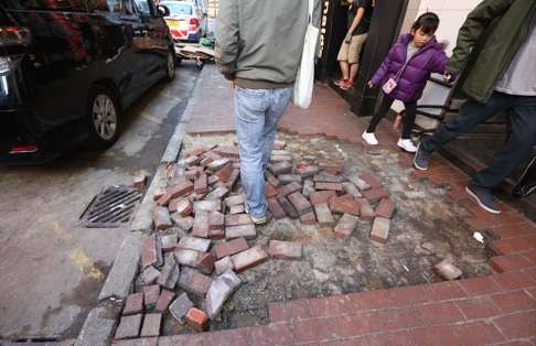 A pavement torn up during the Mong Kok riot. Photo: Nora Tam