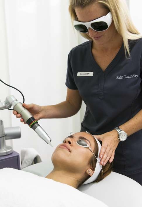 A client receives a facial at Skin Laundry.