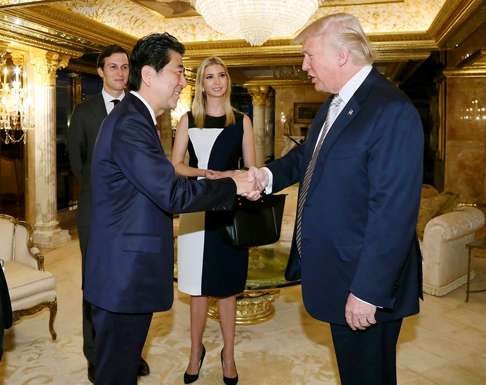 Japanese Prime Minister Shinzo Abe meets US President-elect Donald Trump earlier this month in New York, while Trump’s daughter Ivanka and her husband Jared Kushner look on. Photo: AFP