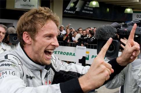 Jenson Button celebrates after winning the 2009 Formula One world title with Brawn. Photo: AFP