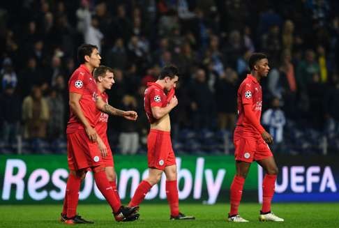 Dejected Leicester City players walk off after the 5-0 thrashing. Photo: AFP