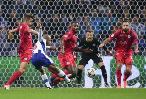Porto’s Algerian forward Yacine Brahimi shoots at goal. Photo: AFP