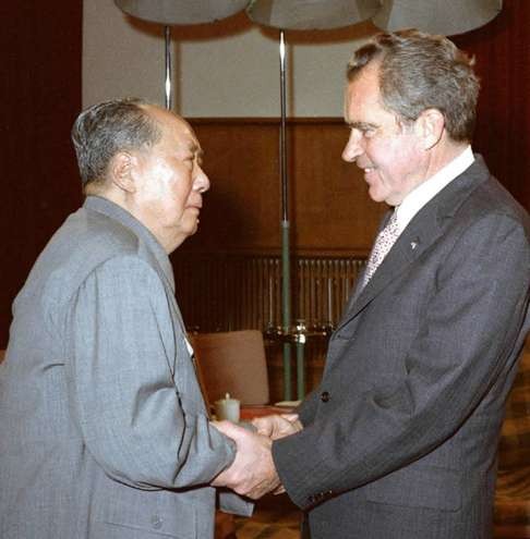 Then US president Richard Nixon shakes hands with chairman Mao Zedong in Beijing on February 21, 1972. Photo: Xinhua