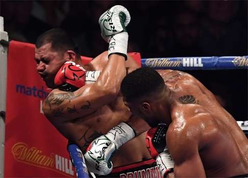 Joshua delivers the winning punch against Eric Molina during their IBF world heavyweight championship clash. Photo: AFP
