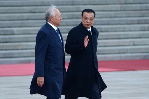 Malaysia's Prime Minister Najib Razak (left) with China’s Premier Li Keqiang in Beijing in November during his visit which saw him sign US$30 billion worth of deals. Photo: AFP