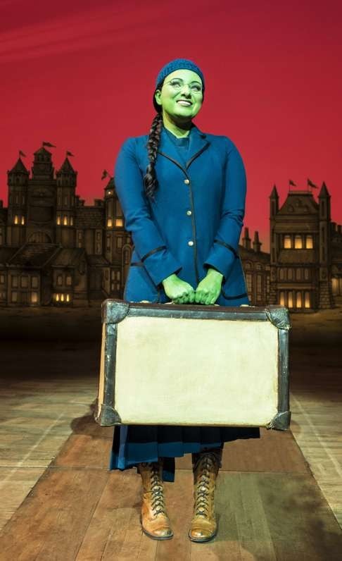 Jacqueline Hughes as Elphaba/ the Wicked Witch of the West.