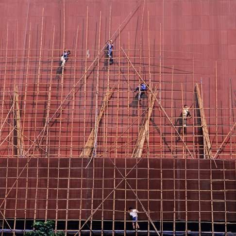 Scaffolders at City Hall in Central. Photo: Keith Macgregor