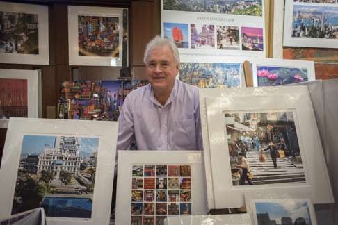 Keith Macgregor, who has been photographing Hong Kong for the past 47 years, with some of his pictures at the Conrad Fair, Admiralty, on November 29. Photo: Antony Dickson