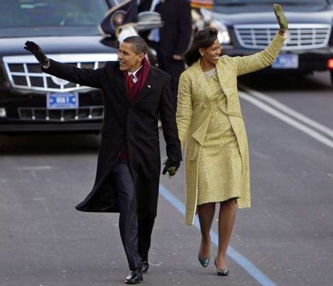 Michelle Obama in a two-piece lemongrass-hued ensemble by Cuban-American designer Isabel Toledo. Photo: AP