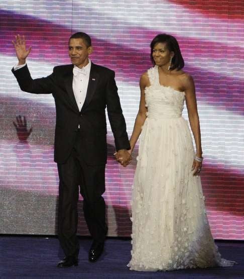 Michelle Obama in a one-shouldered white gown by designer Jason Wu in 2009. Photo: AP