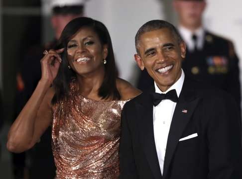 Michelle Obama wearing Versace ar the White House in 2016. Photo: AP