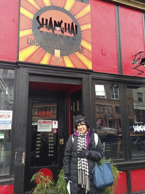 Writer Amy Wu stands in front of Shanghai Tunnel, a bar/restaurant in Portland.