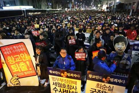 The monk was among protesters in Seoul calling for President Park to step down. Photo: EPA