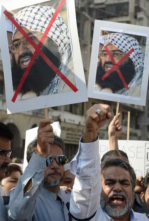 Indian activists carrying portraits of Jaish-e-Mohammed chief Maulana Masood Azhar shout anti-Pakistan slogans as they protest about an attack two days earlier on the Pathankot air force base near the border, in Mumbai in January last year. Photo: AFP