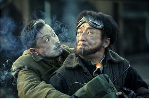 Jackie Chan (right) and Hiroyuki Ikeuchi in a scene from Railroad Tigers.